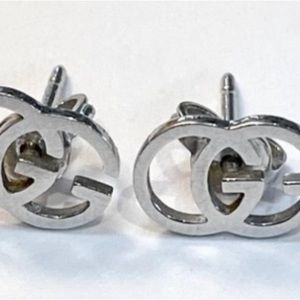 Gorgeous, authentic, vintage, 1990s, 18k gold Gucci stud earrings.